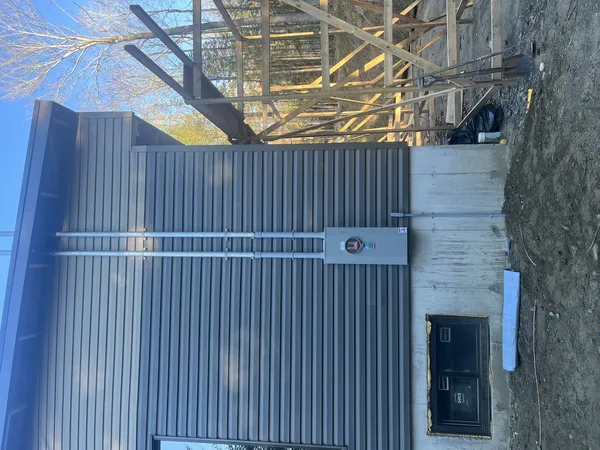 Exterior electrical panel on building