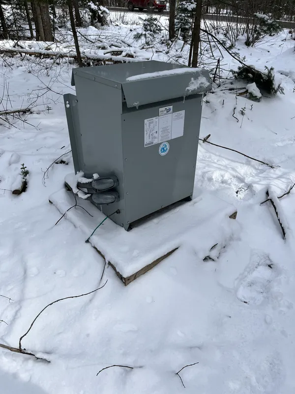 Transformer on concrete base in snow